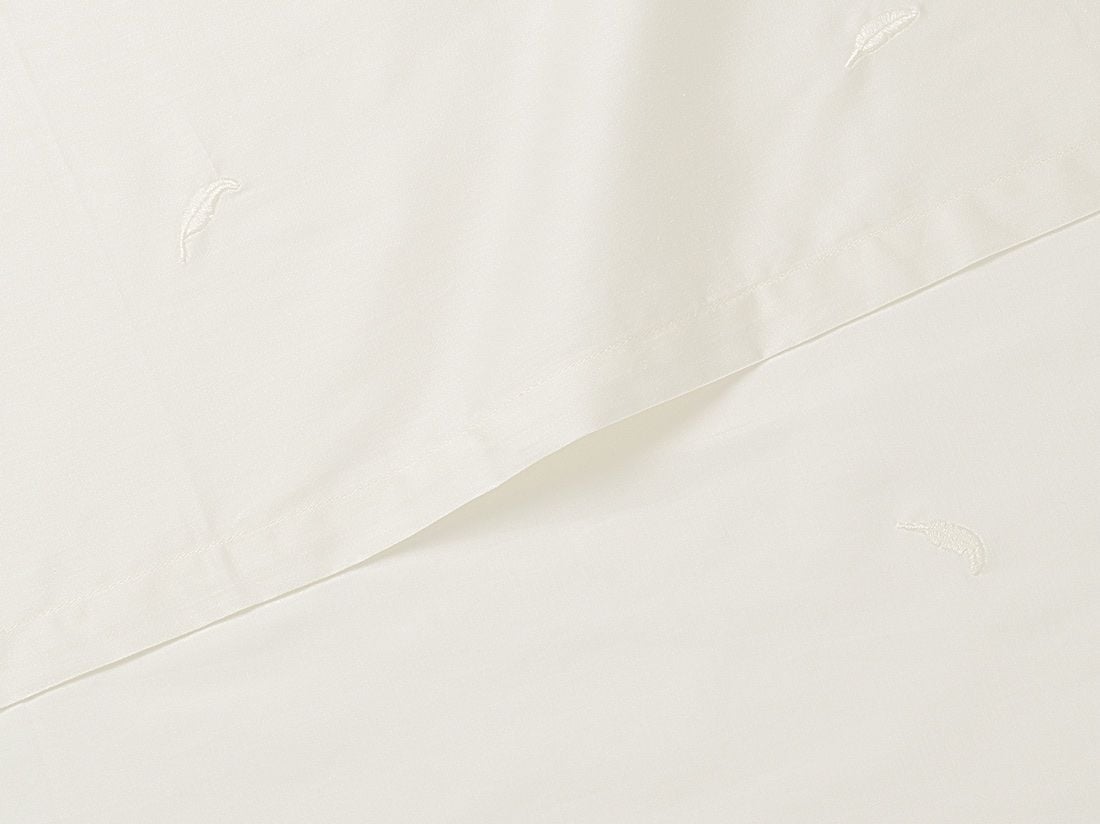 Børnelagen bomuldssatin warm white feather