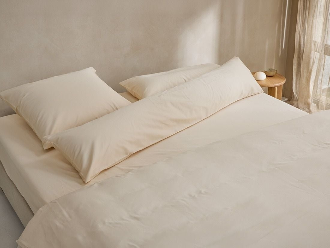 Pudebetræk lang multipude bomuldssatin almond milk 37x160