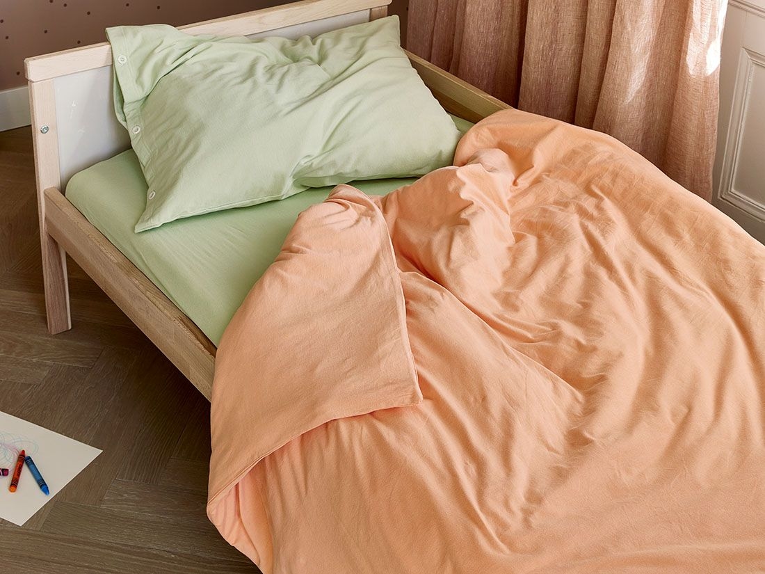 Juniordynebetræk jersey perfect peach