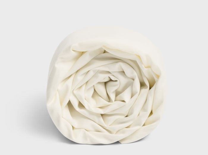 Børnelagen bomuldssatin warm white feather